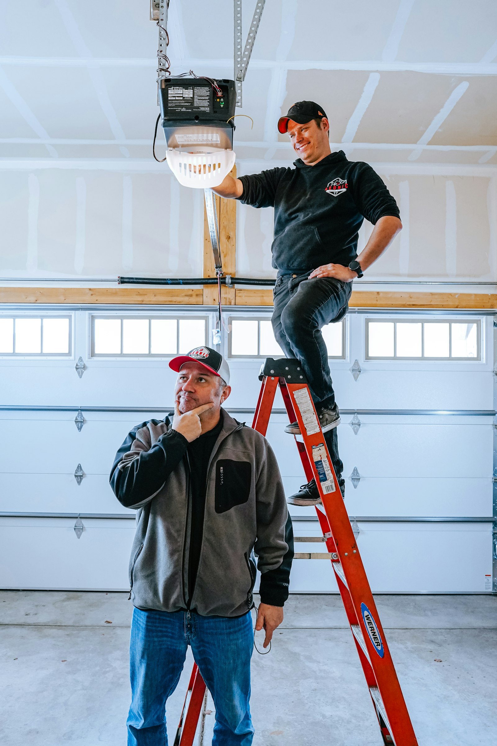 Electrician working safely in a bright home