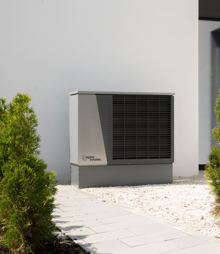 Modern residential heat pump and AC unit outside a home