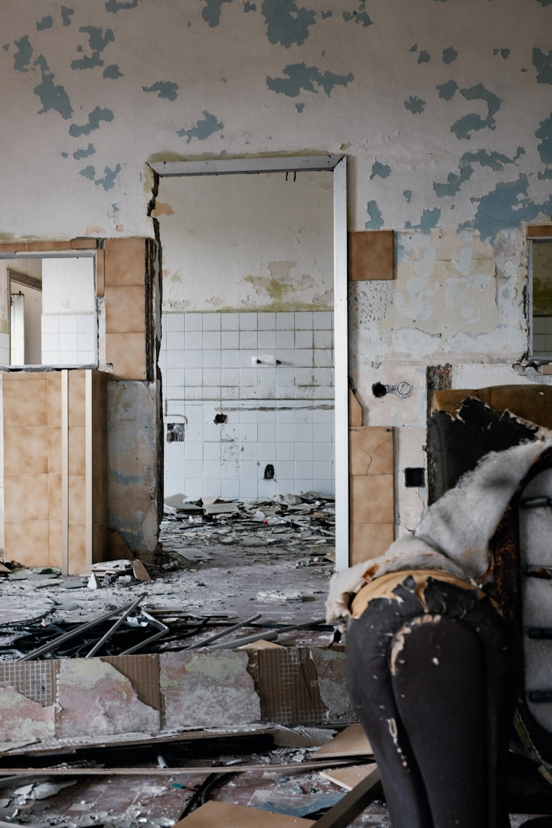 Water and mold damage on a wall being remediated