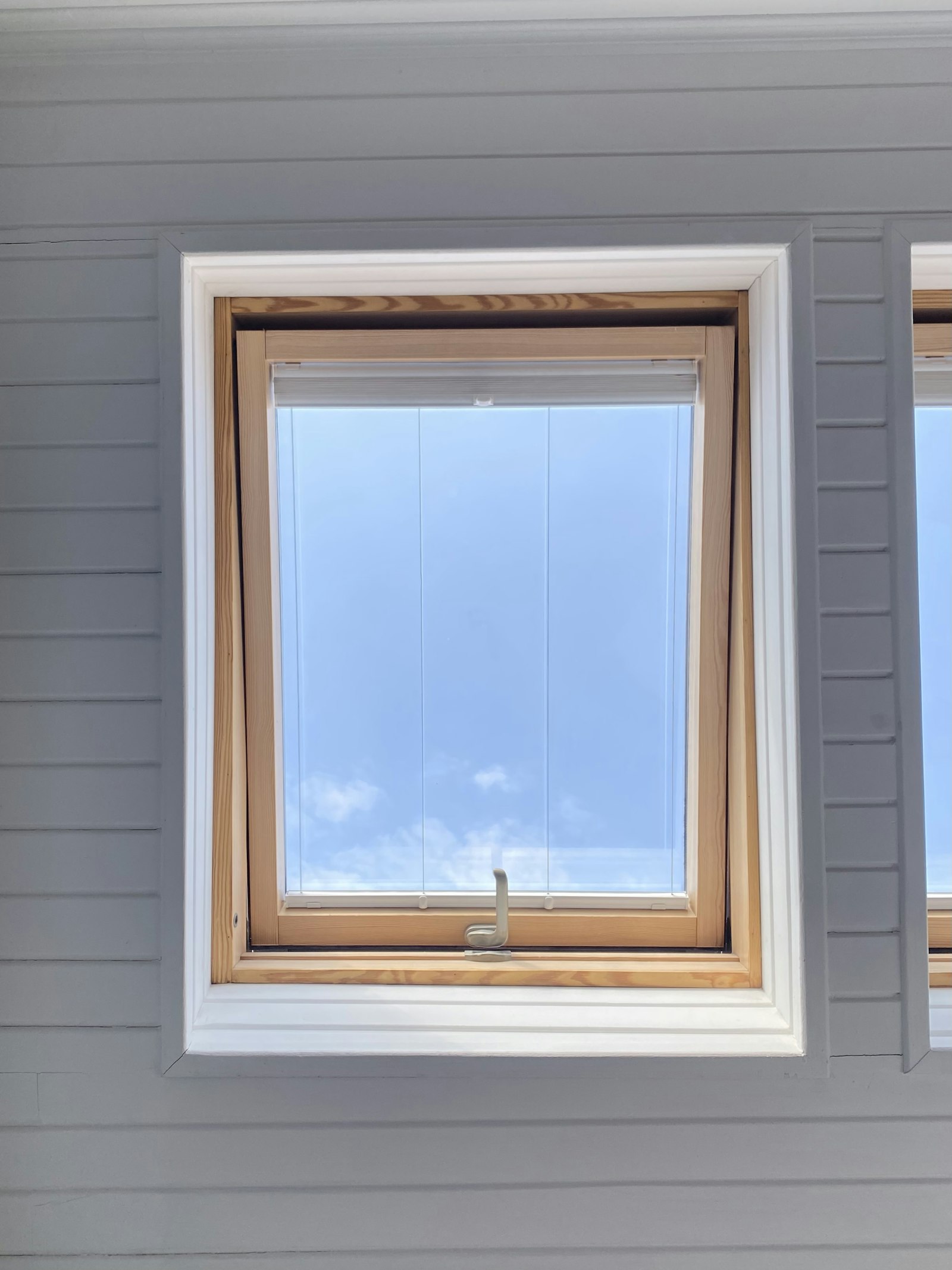 Technician installing a new replacement window
